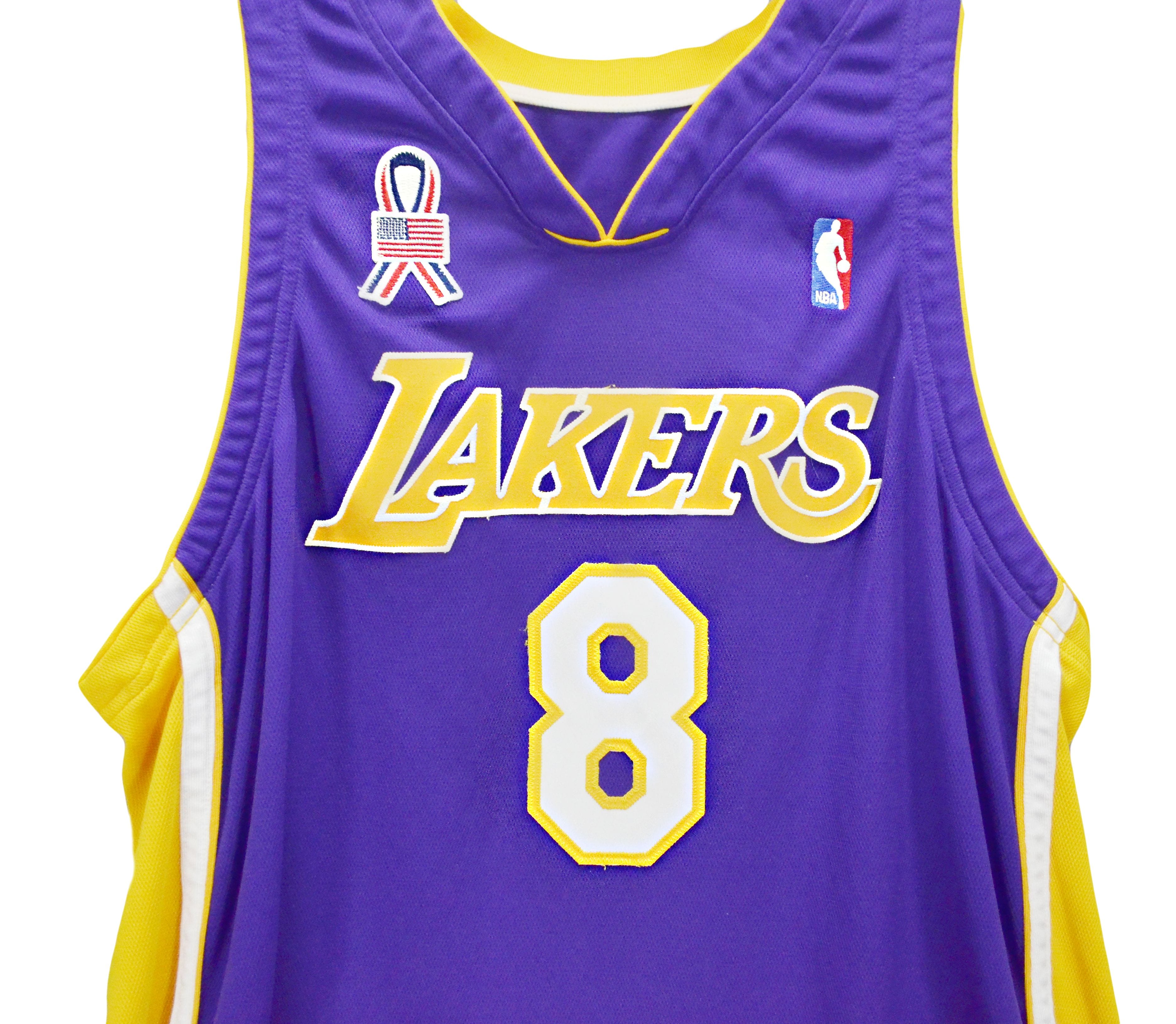 white and blue lakers jersey