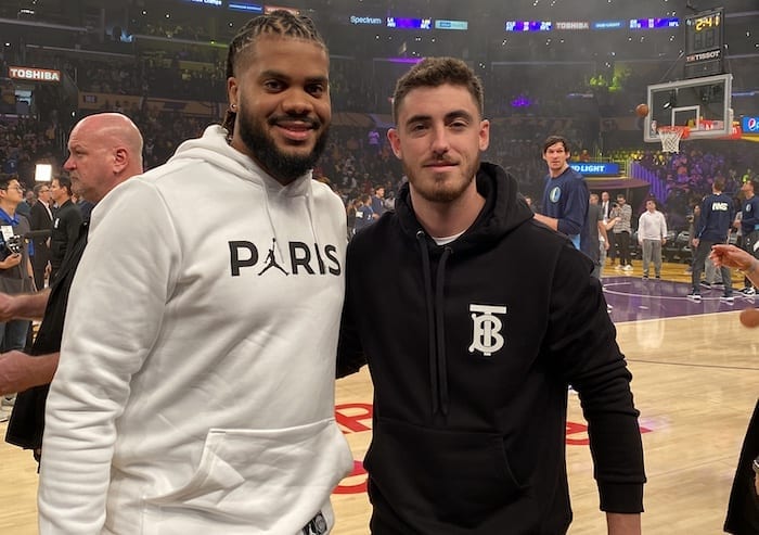 Los Angeles Dodgers teammates Cody Bellinger and Kenley Jansen watch a Los Angeles Lakers game at Staples Center