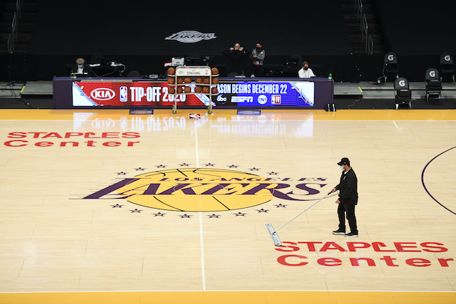 Lakers logo, Staples Center court view, mopping floor