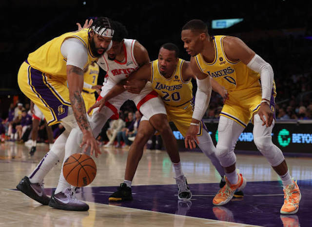 James, Davis help Lakers hold on to beat Rockets, tie series - The